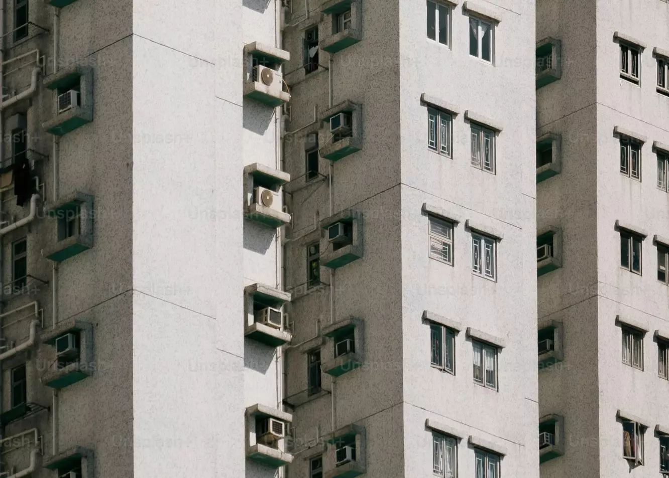 Towering Urban Canvas: Modern Apartment Building Facade