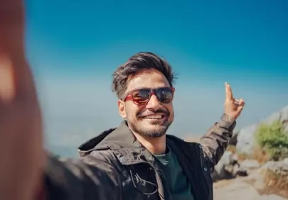 Thrilled Mountain Hiker Captures Epic Summit Selfie