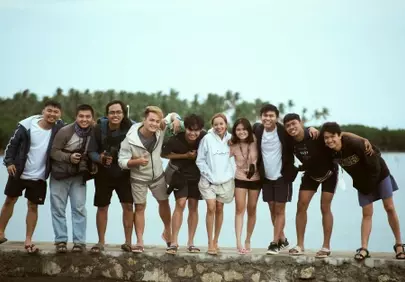 Joyful Gathering: Diverse Friends United by the Water's Edge