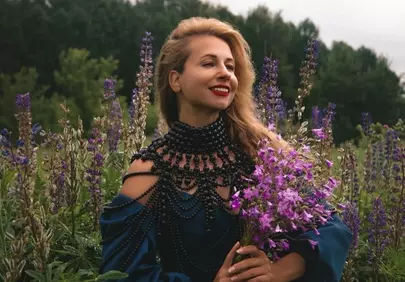Enchanting Summer Blossom: Woman in Lupine Field