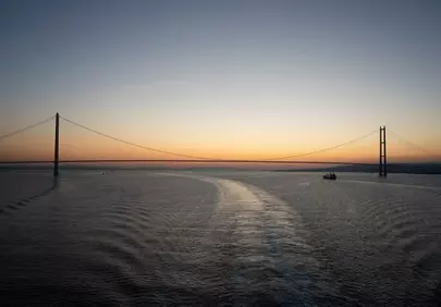 Breathtaking Sunset Over Serene Sea Bridge
