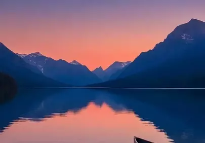 Enchanting Lake Sunset with Full Moon and Lone Boat