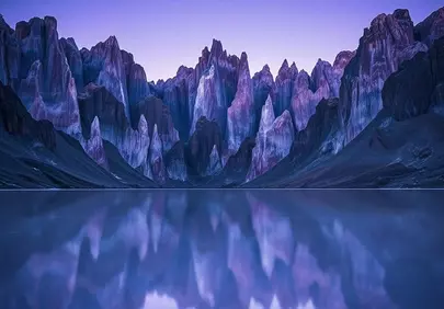 Breathtaking Twilight: Majestic Mountains Reflected in Serene Lake