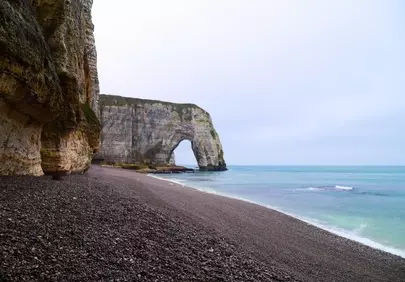 Breathtaking Étretat: Majestic Cliffs Meet Serene Pebble Beaches