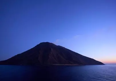 Mystical Stromboli: Volcano's Embrace at Twilight
