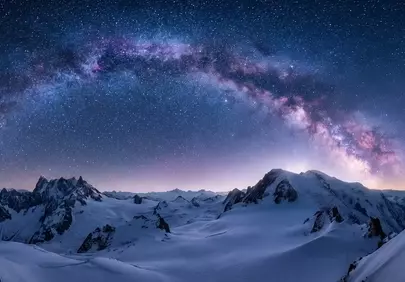 Breathtaking Milky Way Arch Over Snowy Alpine Peaks
