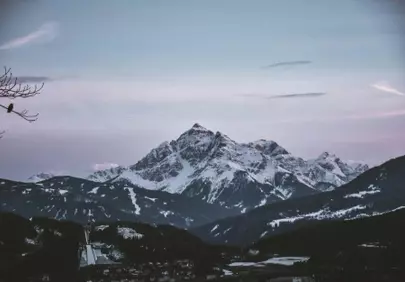 Majestic Alpine Peaks: Serene Snow-Capped Mountainscape