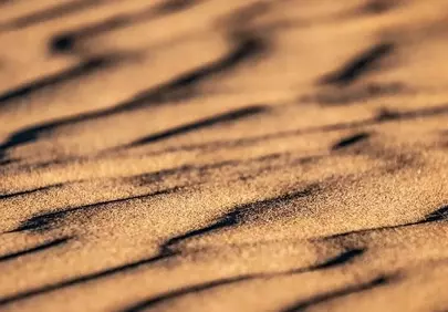 Stunning Desert Dunes: Golden Sand Waves & Shadows