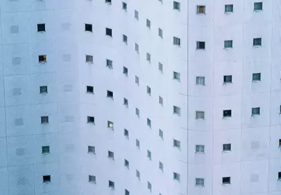 Hypnotic Urban Rhythms: Modern Building Facade with Grid Windows