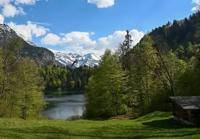 Breathtaking Alpine Panorama: Freibergsee's Serene Spring Beauty