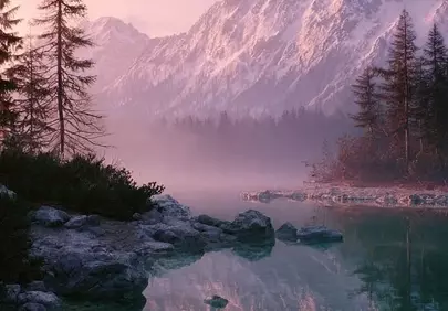 Enchanting Pink Sunset Over Misty Mountain Lake