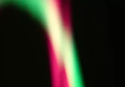 Vibrant Abstract Light Streaks: Pink, Yellow, Green Glow