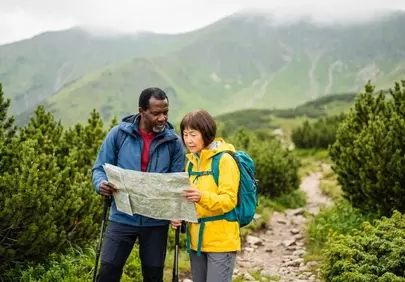 Timeless Adventure: Senior Couple Exploring Mountain Trails