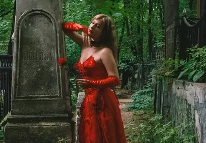 Enchanting Gothic Beauty Amidst Forest Tombs