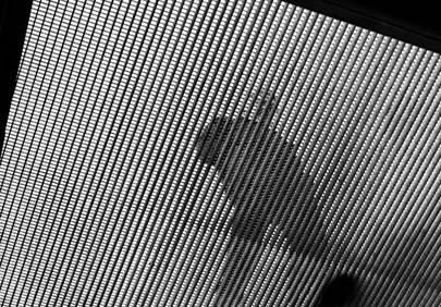 Mesmerizing Abstract: Light and Shadow Play on a Grid