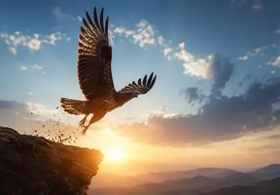Majestic Eagle Soaring at Sunset Over Mountain Peaks