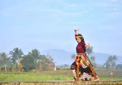 Vibrant Indonesian Dancer in Traditional Batik