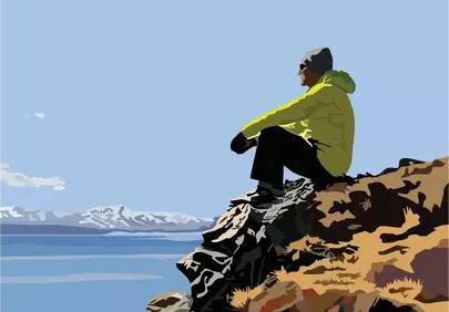 Serene Solitude: Hiker on Cliff Overlooking Winter Lake