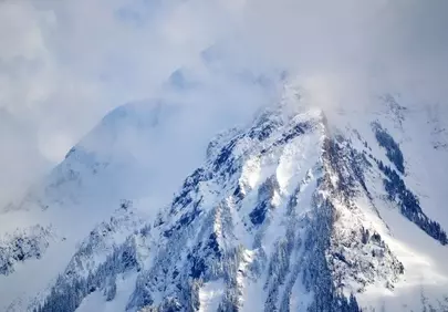 Breathtaking Snowy Peaks: Majestic Winter Alpine Landscape