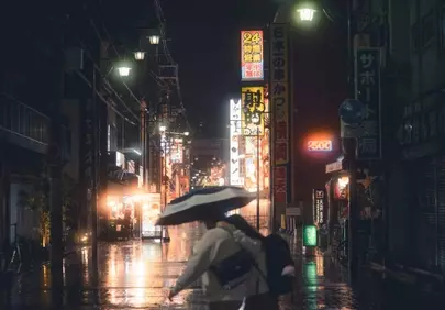 Enchanting Night: Couple Under Umbrella in Neon City Rain