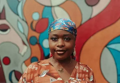 Vibrant Woman: Artful Elegance in Colorful Headscarf