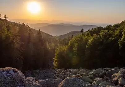 Breathtaking Sunset Over Serene Mountain Wilderness