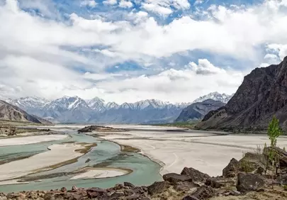 Breathtaking Karakoram: Shigar River's Majestic Mountain Embrace
