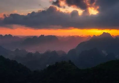 Dramatic Sunset Over Vietnam's Misty Mountains