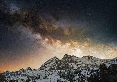 Breathtaking Milky Way Over Majestic Snowy Mountains