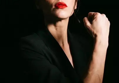 Empowered Woman: Red Lips & Unyielding Strength