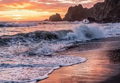 Breathtaking Coastal Sunset: Fiery Skies & Crashing Waves