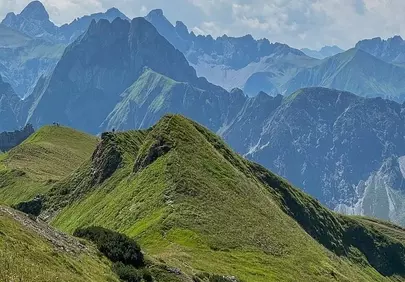 Breathtaking Alpine Panorama: Summer Hike Through Majestic Peaks