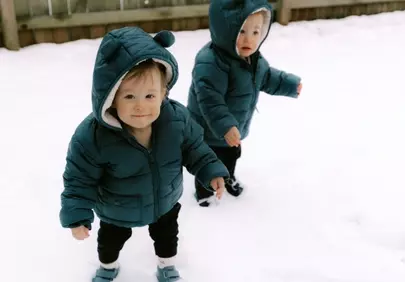 Adorable Toddlers Discovering Winter Wonderland Fun