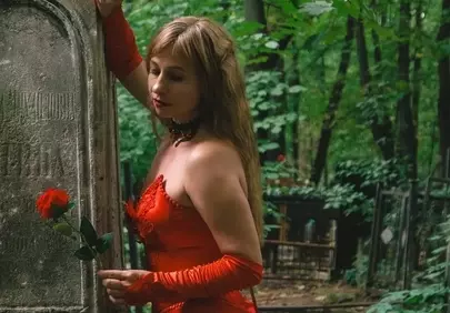 Enchanting Gothic Romance: Woman in Red in a Mystical Forest