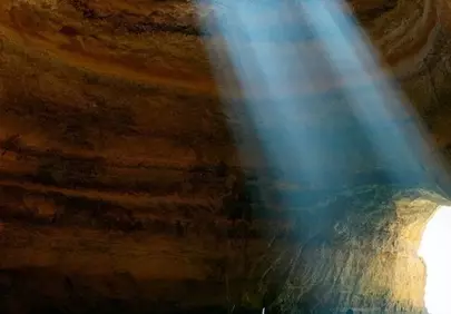 Breathtaking Benagil Cave: Sunlit Sea and Serene Shadows