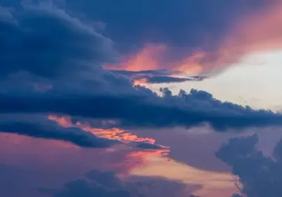 Dramatic Twilight: Storm Clouds Paint the Sunset Sky