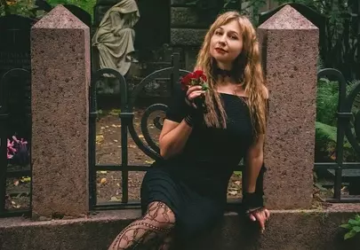 Enchanting Gothic Elegance Amidst Autumnal Graveyard Serenity