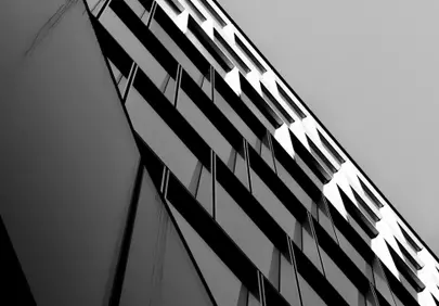 Striking Modern Skyscraper: Geometric Patterns in Black & White