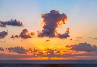 Breathtaking Ocean Sunset with Fiery Clouds