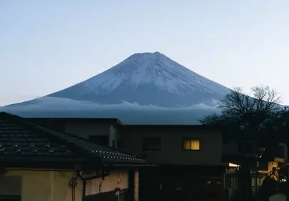 Majestic Fuji: Snow-Capped Peak Overlooks Tranquil Town
