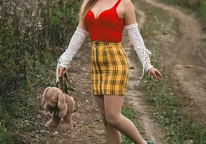 Charming Blonde in Autumn Field: Eclectic Fashion & Rural Serenity