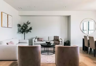 Chic Minimalist Living: Modern Comfort in White & Wood