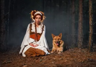 Enchanting Forest Duo: Woman & Dog at Sunset