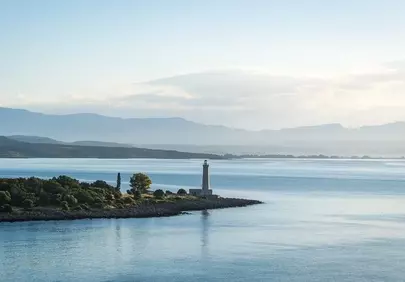 Serene Coastal Lighthouse: Tranquil Dawn Seascape