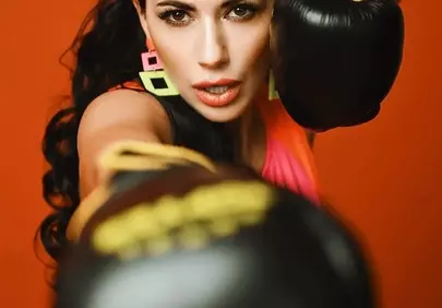 Empowered Boxer: Striking Pose with Fierce Determination