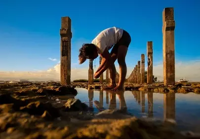 Stunning Sunset Solitude: Reflecting by Ancient Pillars
