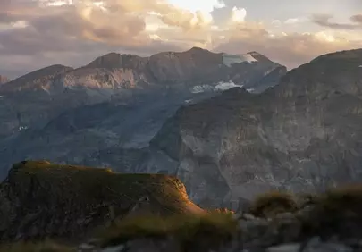 Dramatic Alps Sunrise: Golden Light on Rugged Peaks