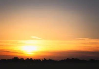 Breathtaking Golden Sunset Over Serene Horizon