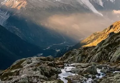 Breathtaking Alps: Majestic Peaks, Serene River, Golden Dawn