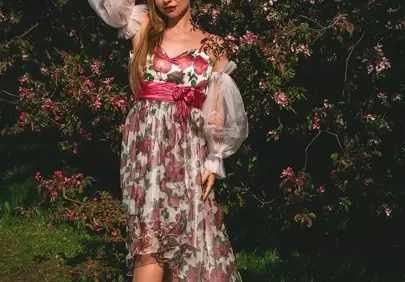 Enchanting Spring Blossom Portrait: Woman in Floral Gown